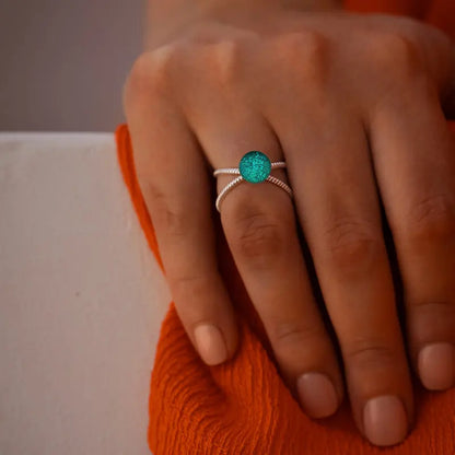 Bague entrelacée boule en argent, verte emeria