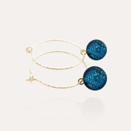 Boucles d'oreilles créoles torsadées pendantes originales en or bleu azuline