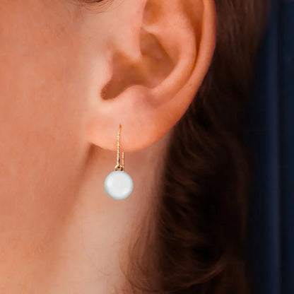 Boucles d'oreilles crochet Murano glass en plaqué or blanches lumine
