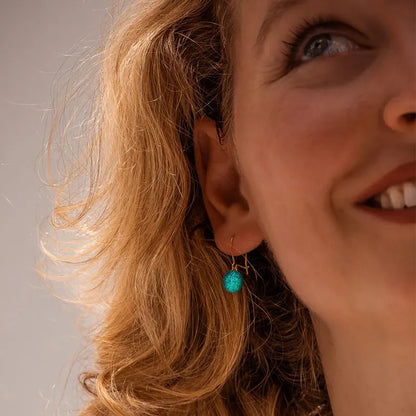 Boucles d'oreilles dormeuses cadeau pour une femme de 70 ans or vertes emeria